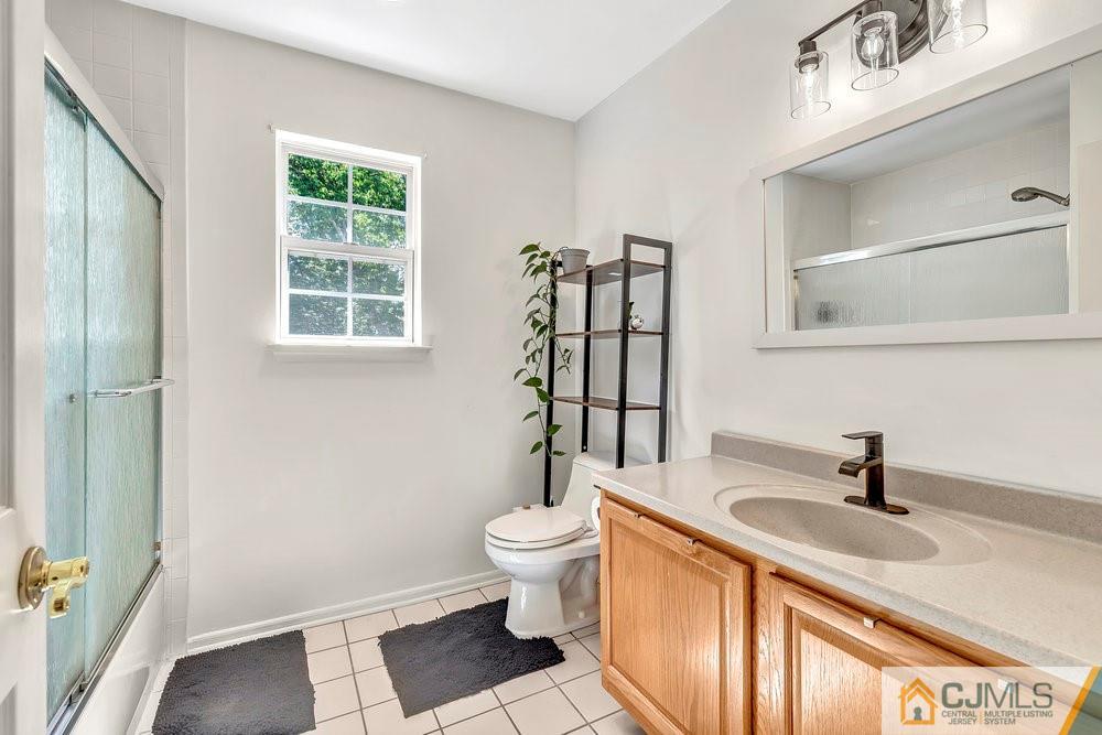 5 Netty Street Howell, NJ 07731 - Photo 21 of 36 a bathroom with a sink toilet and shower