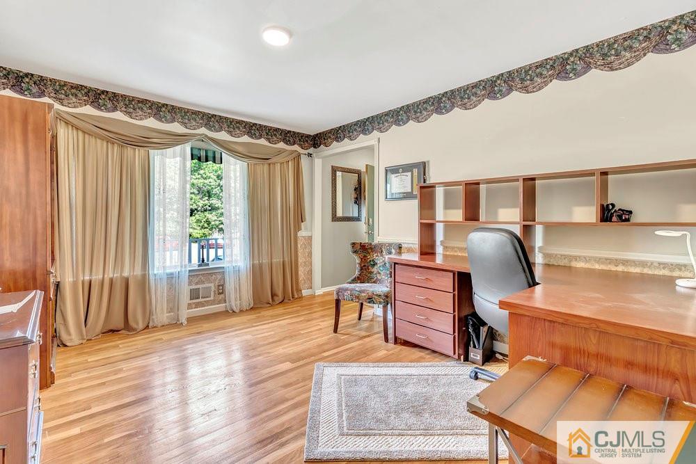 5 Netty Street Howell, NJ 07731 - Photo 7 of 36 a living room with furniture and a wooden floor