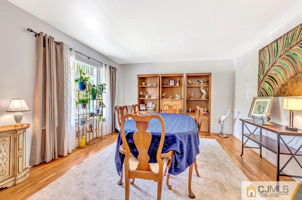 5 Netty Street Howell, NJ 07731 - Photo 9 of 36 a view of a dining room with furniture window and wooden floor
