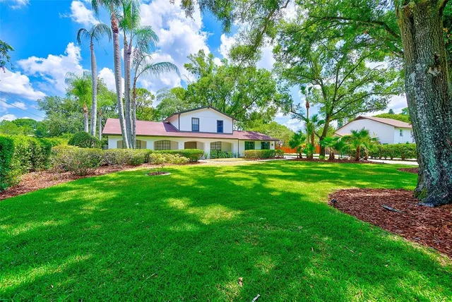 a house with garden in front of it