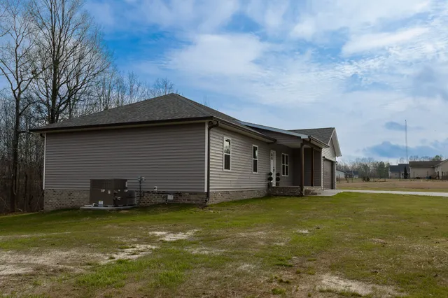 a house view with a garden space