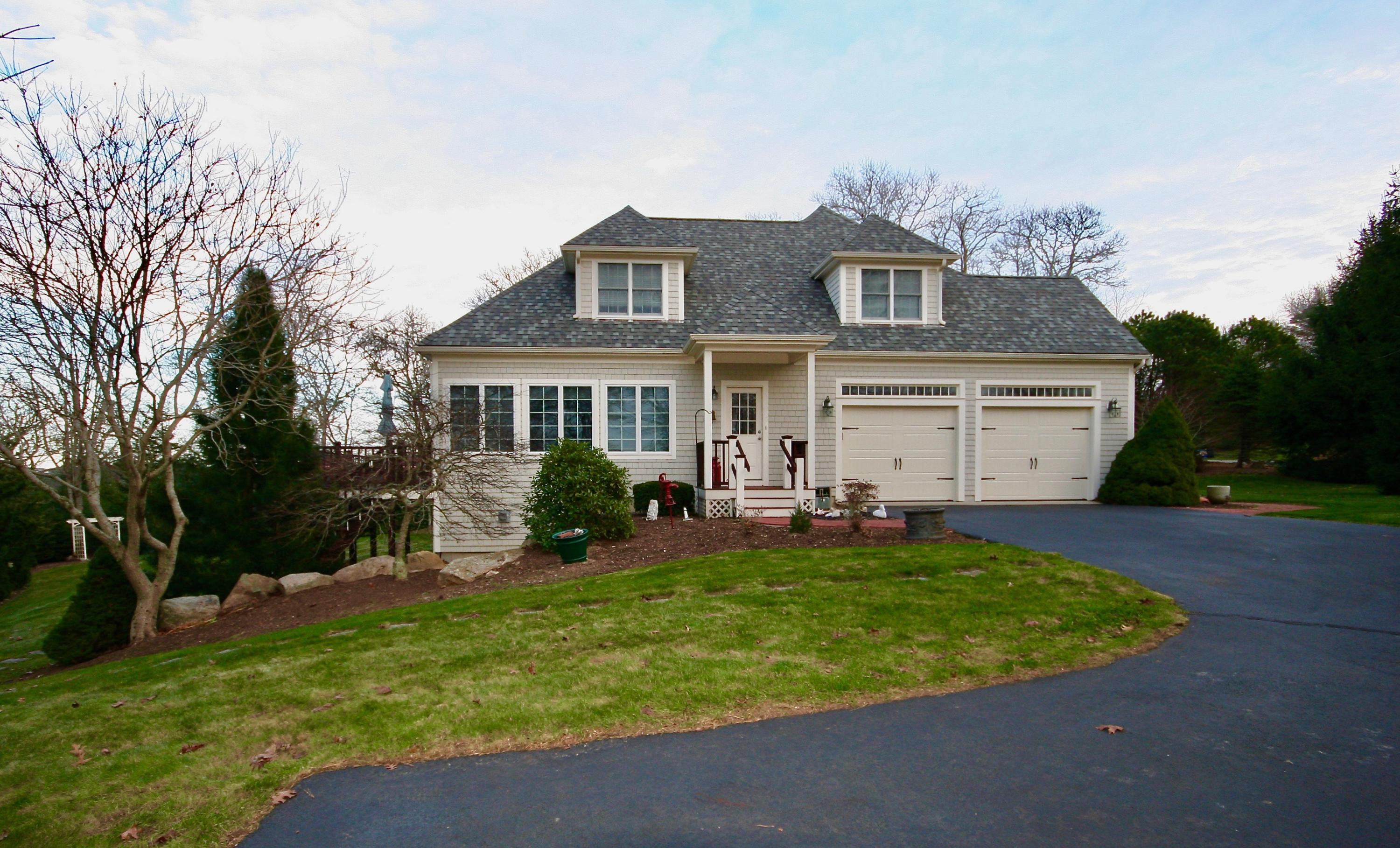 226 Cairn Ridge Road East Falmouth, MA 02536 - Photo 3 of 36 a view of a house with a yard porch and sitting area