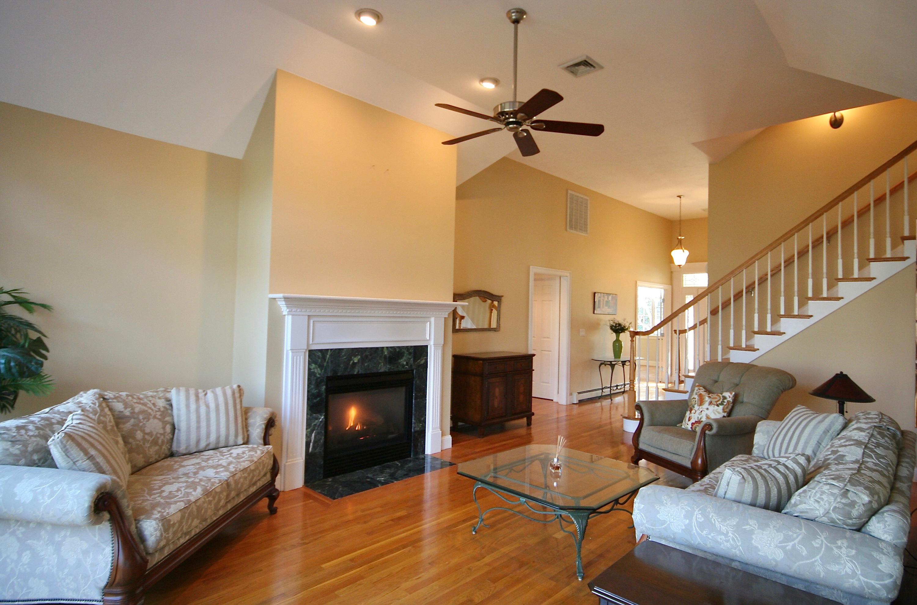 226 Cairn Ridge Road East Falmouth, MA 02536 - Photo 7 of 36 a living room with furniture and a fireplace