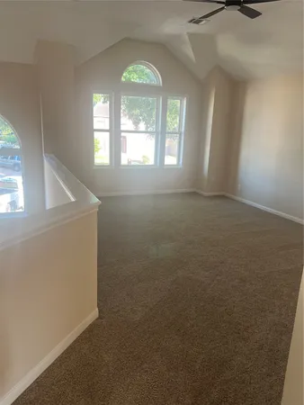 an empty room that has a window