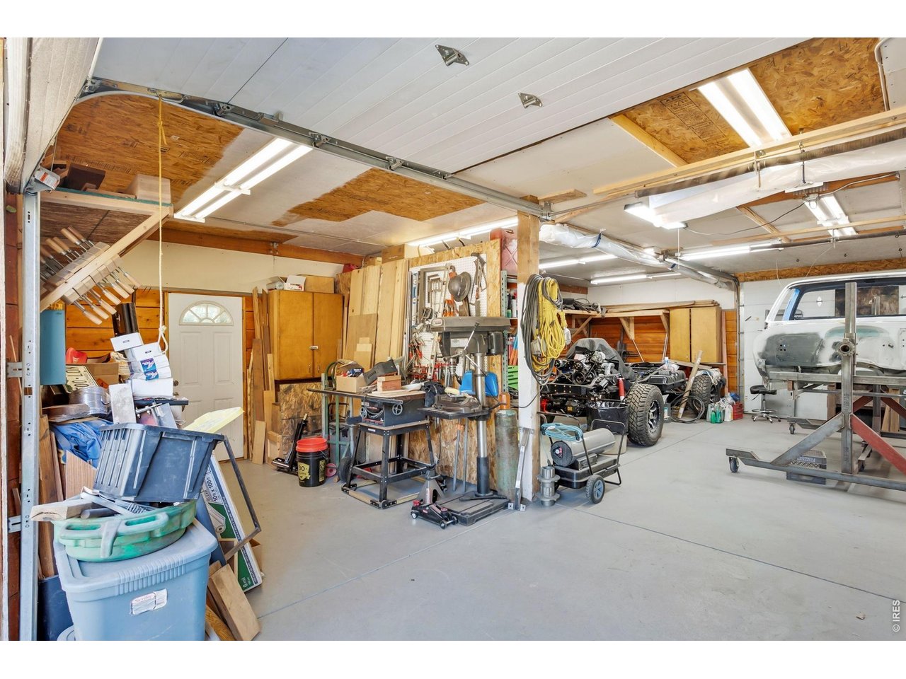1154 Spring Valley Road Bellvue, CO 80512 - Photo 24 of 31 Separate area with man door used for woodworking