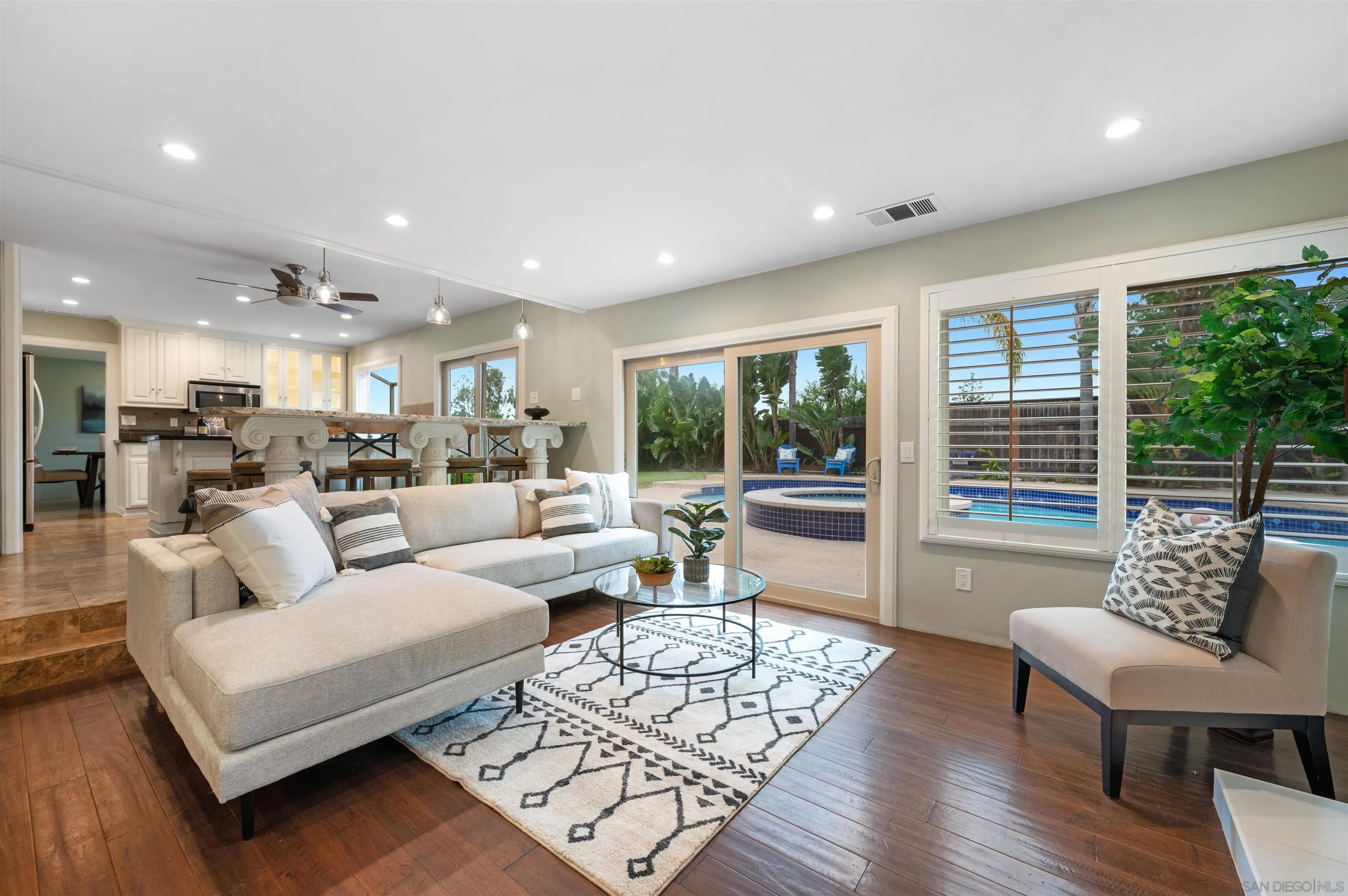2312 Marca Place Carlsbad, CA 92009 - Photo 19 of 56 a living room with furniture and a large window
