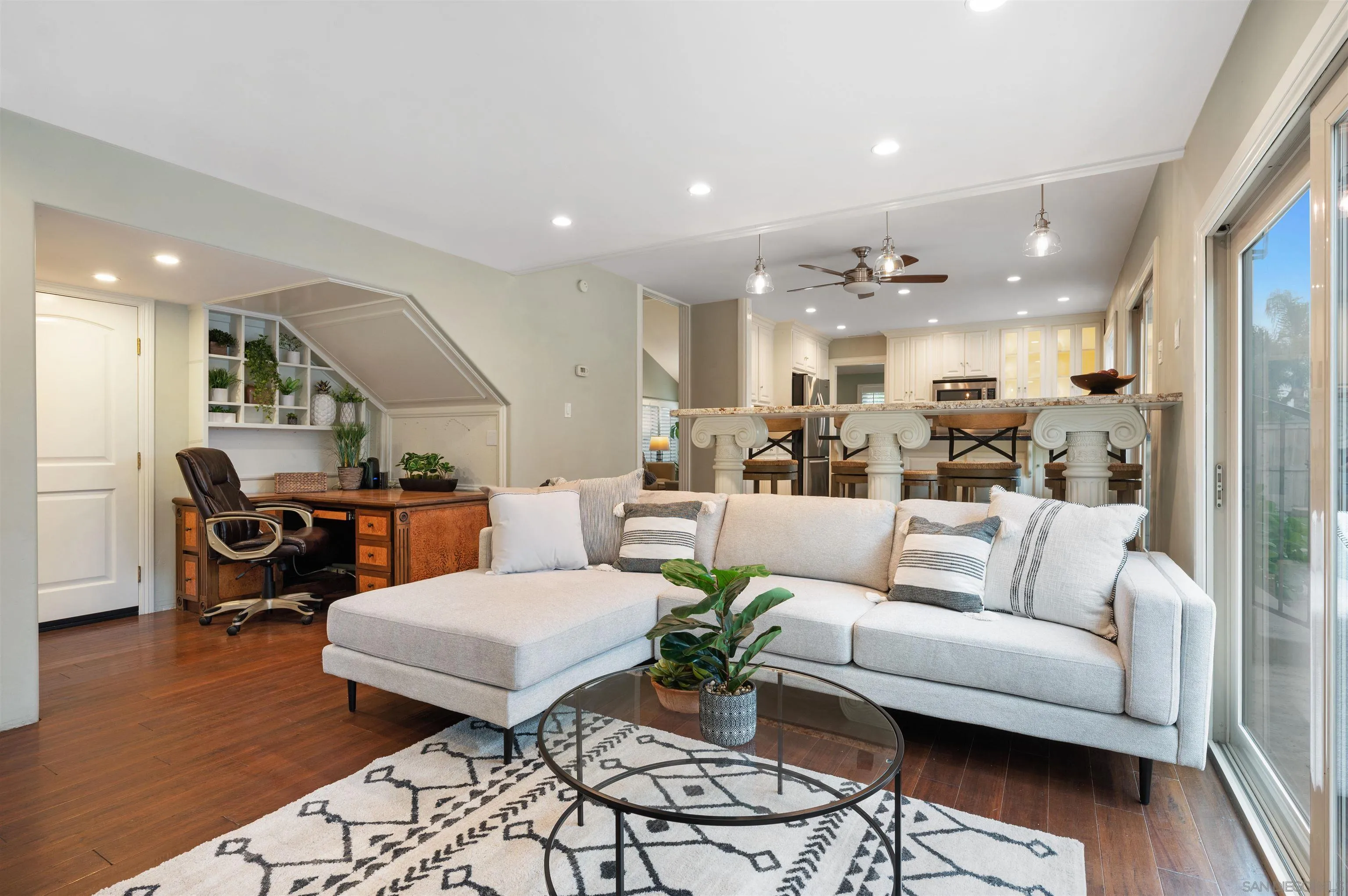 2312 Marca Place Carlsbad, CA 92009 - Photo 20 of 56 a living room with furniture and kitchen view