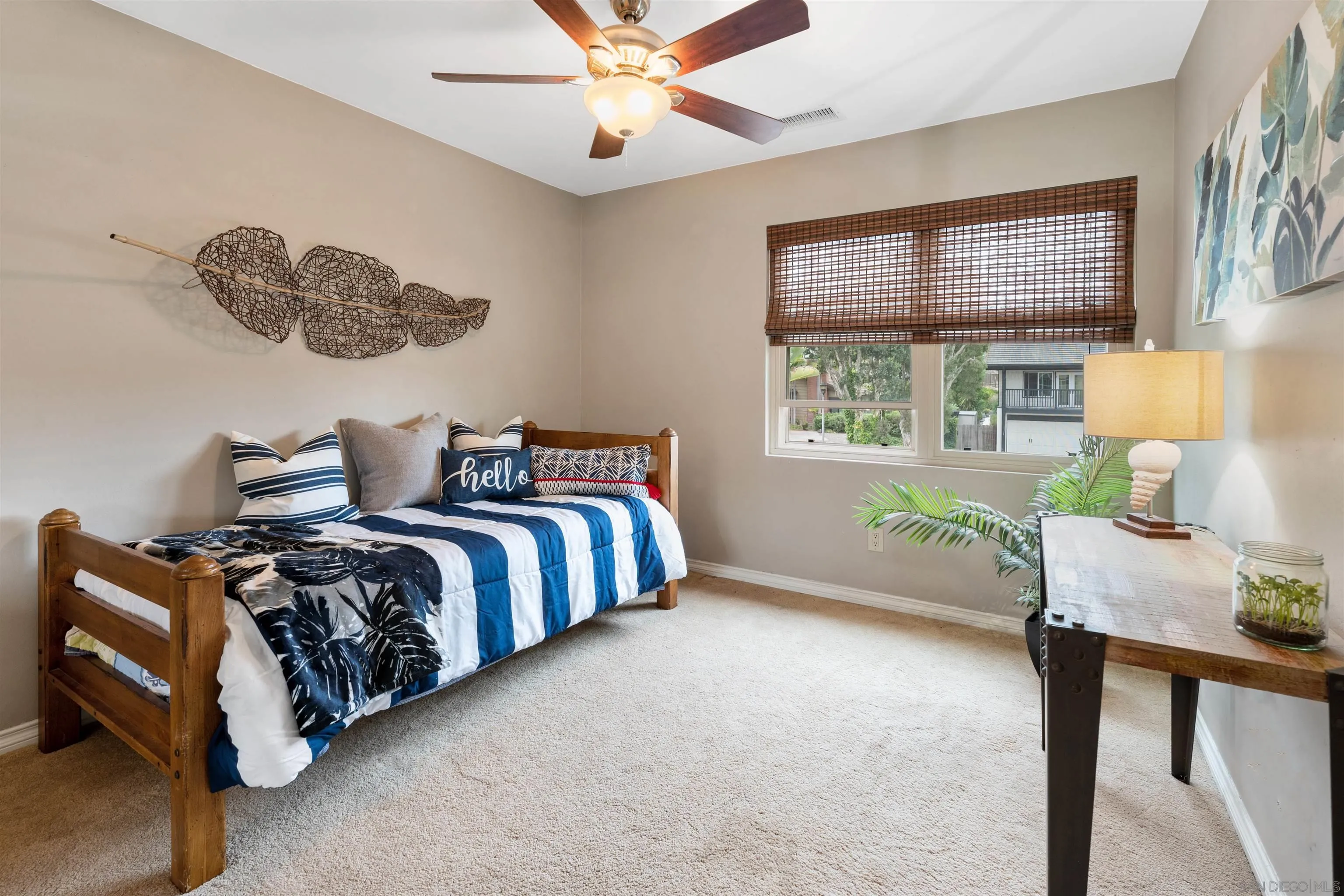 2312 Marca Place Carlsbad, CA 92009 - Photo 26 of 56 a bedroom with bed and a window
