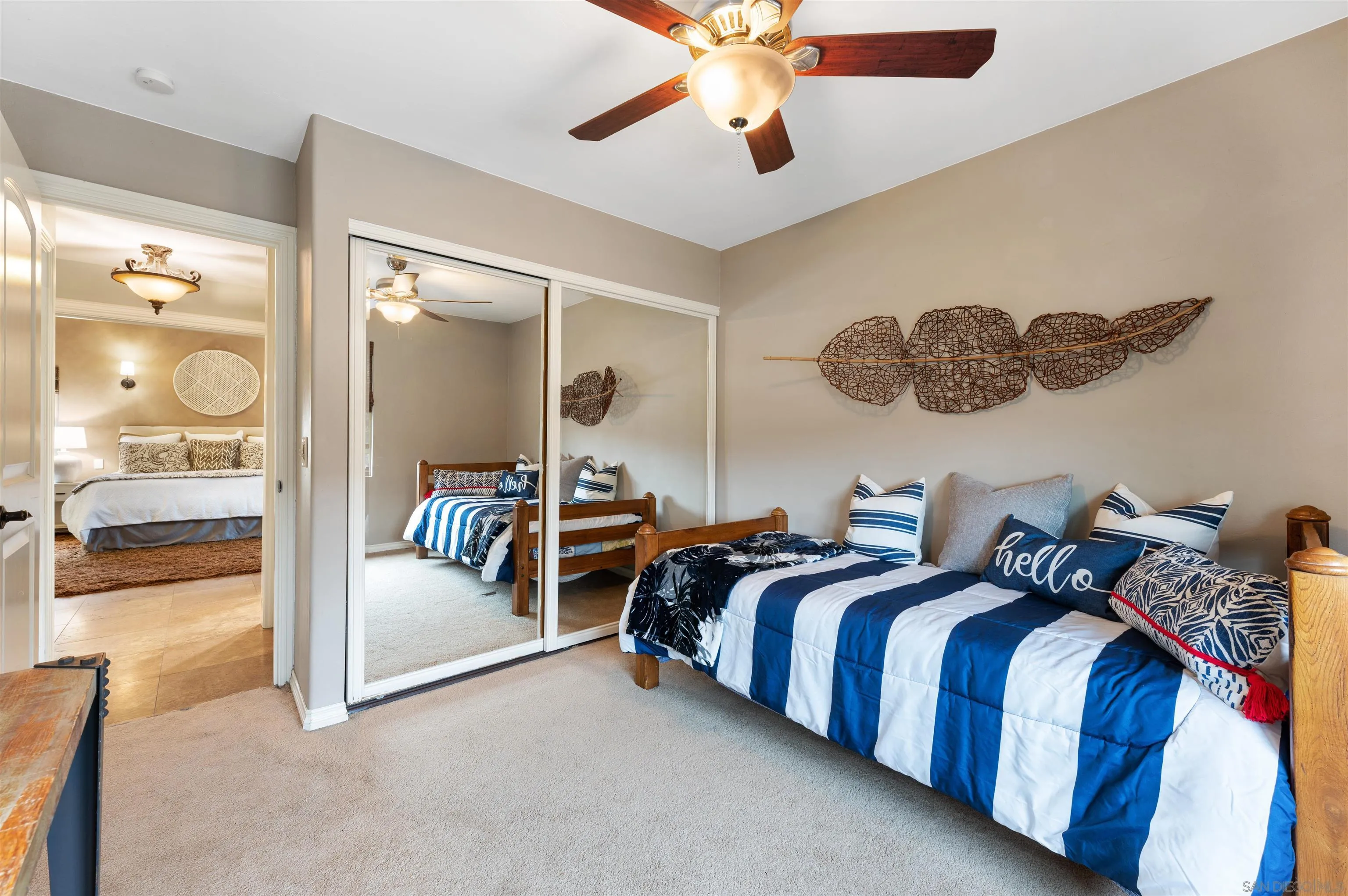 2312 Marca Place Carlsbad, CA 92009 - Photo 27 of 56 a bedroom with two beds and painting on the wall