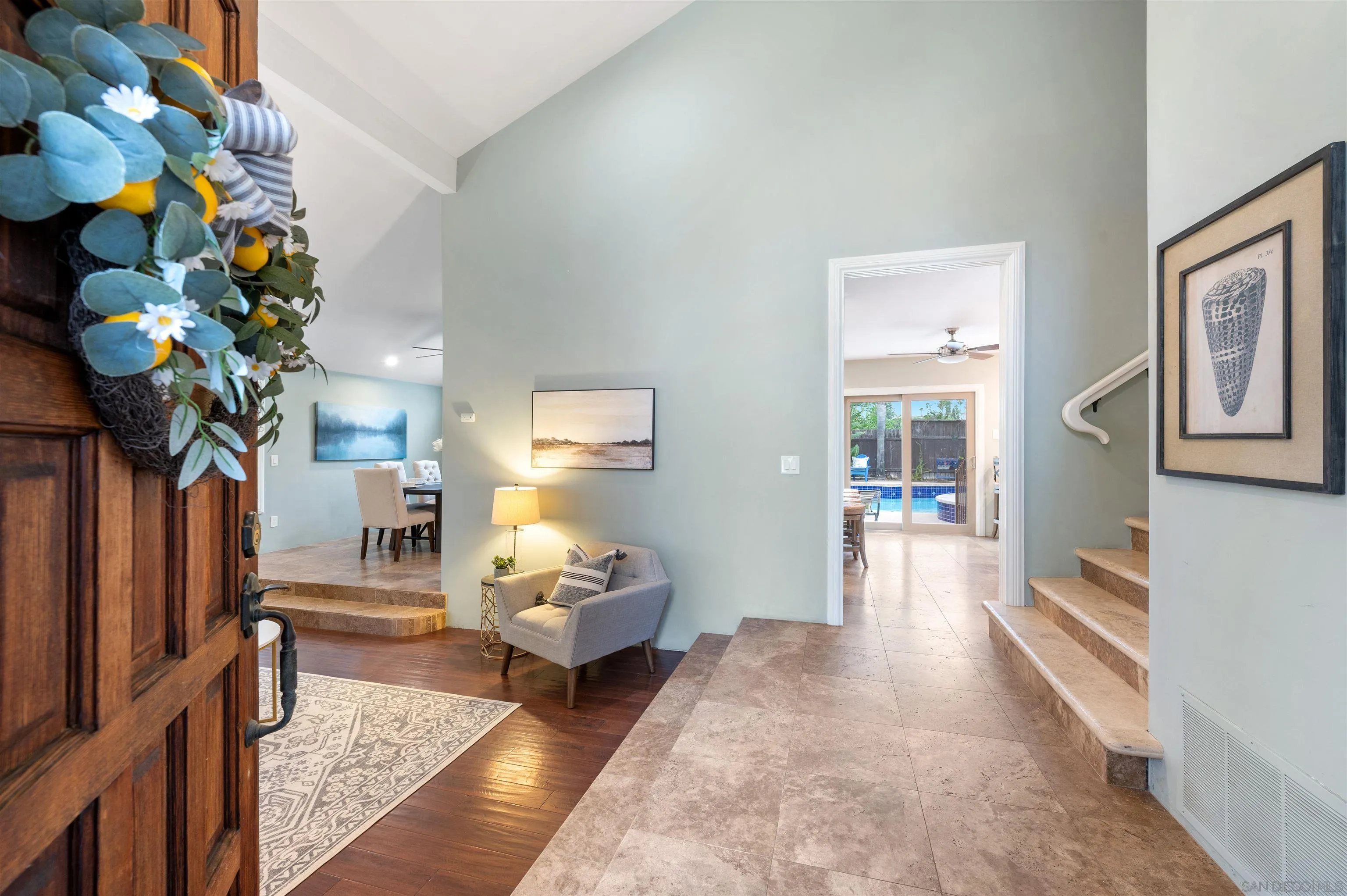 2312 Marca Place Carlsbad, CA 92009 - Photo 3 of 56 a living room with furniture flowerpot and a dining table