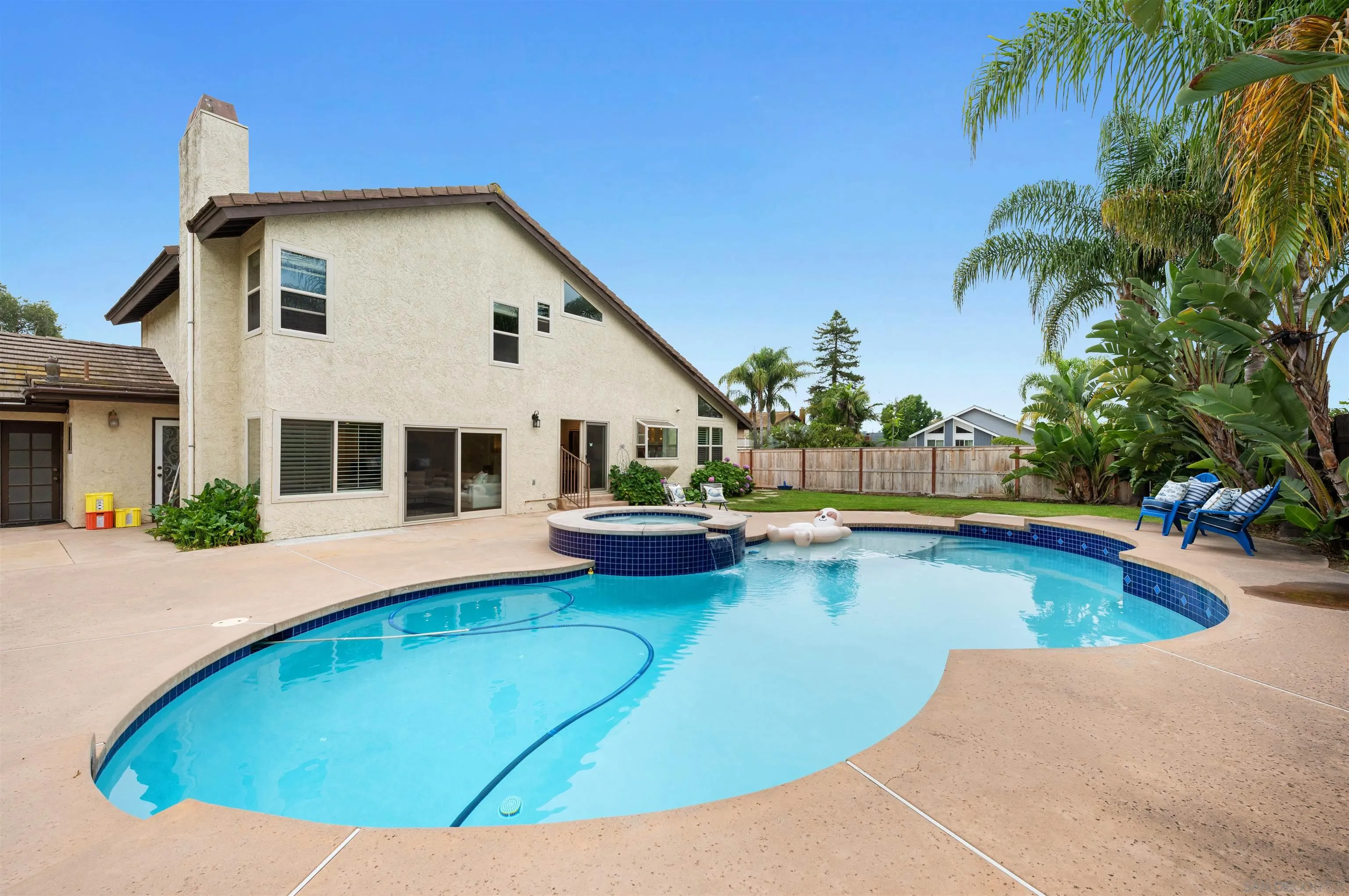 2312 Marca Place Carlsbad, CA 92009 - Photo 36 of 56 a view of a house with swimming pool and sitting area