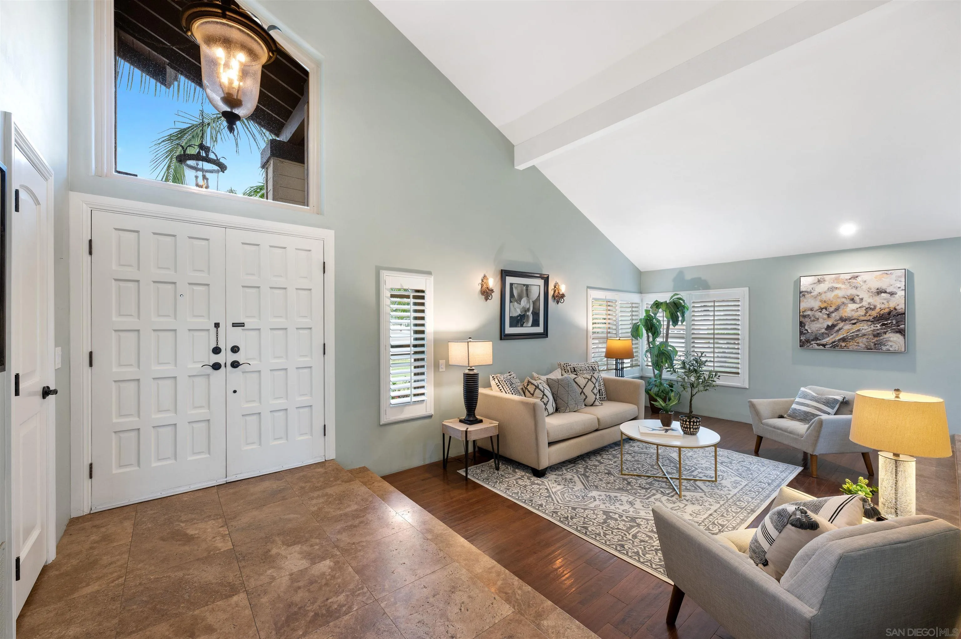 2312 Marca Place Carlsbad, CA 92009 - Photo 4 of 56 a living room with furniture and painting on the wall