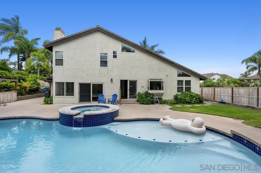 2312 Marca Place Carlsbad, CA 92009 - Photo 42 of 56 a front view of house with yard and outdoor seating