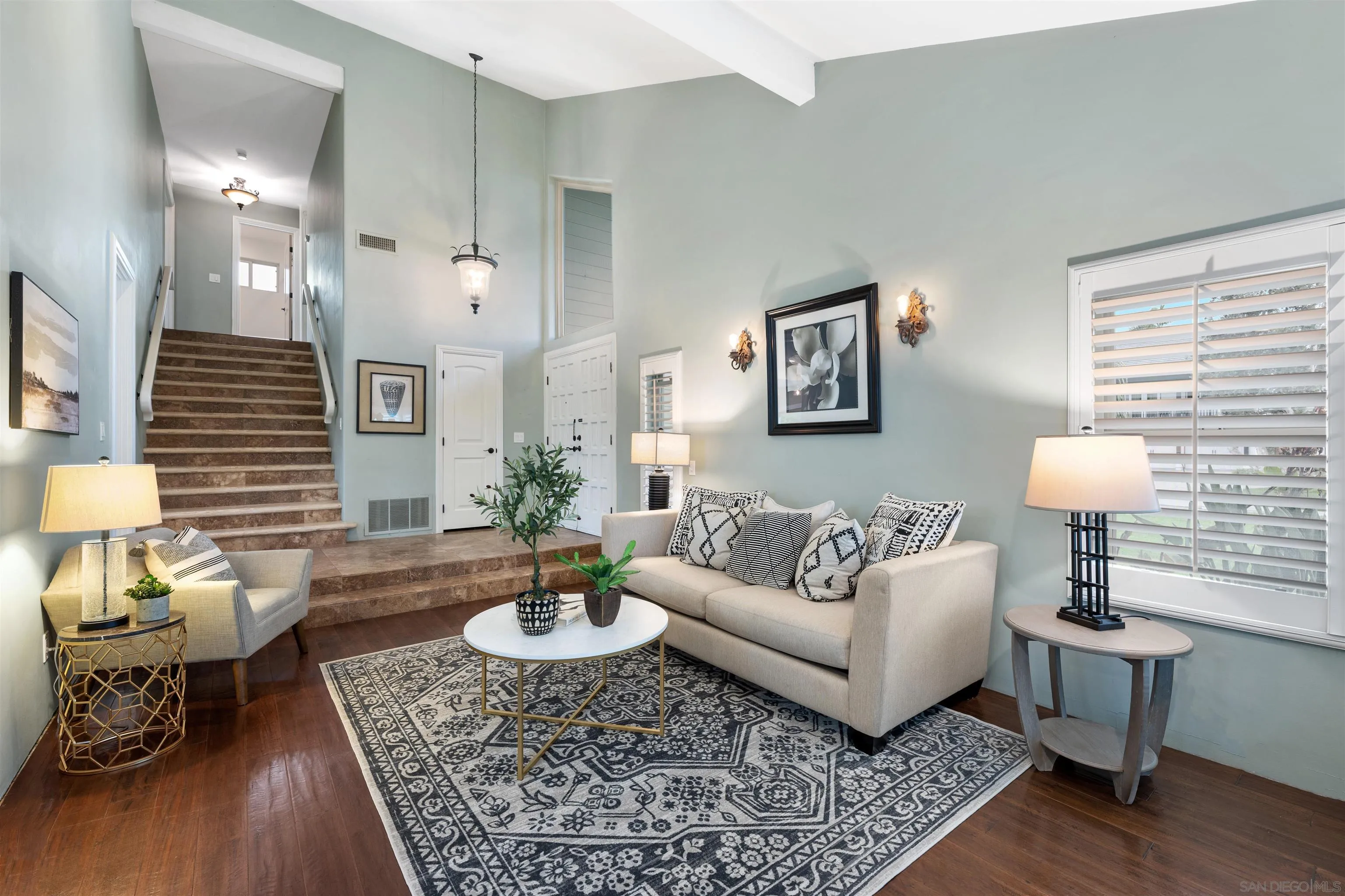 2312 Marca Place Carlsbad, CA 92009 - Photo 6 of 56 a living room with furniture and wooden floor