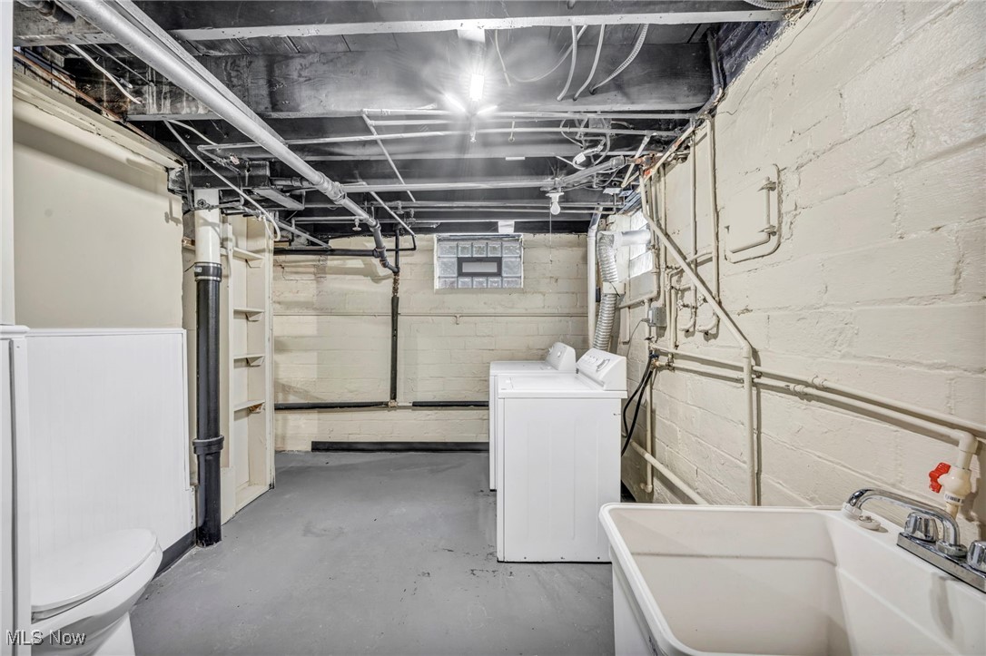 2980 East Overlook Road Cleveland, OH 44118 - Photo 44 of 49 Basement featuring sink and washing machine and dryer