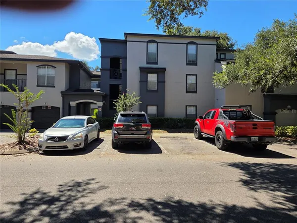 a car parked in front of a house