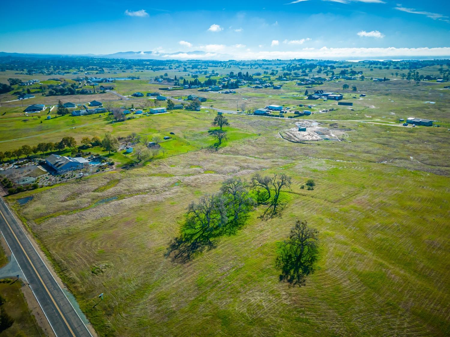 1610 Duck Creek Road Ione, CA 95640 - Photo 13 of 18 a view of a lake with a big yard