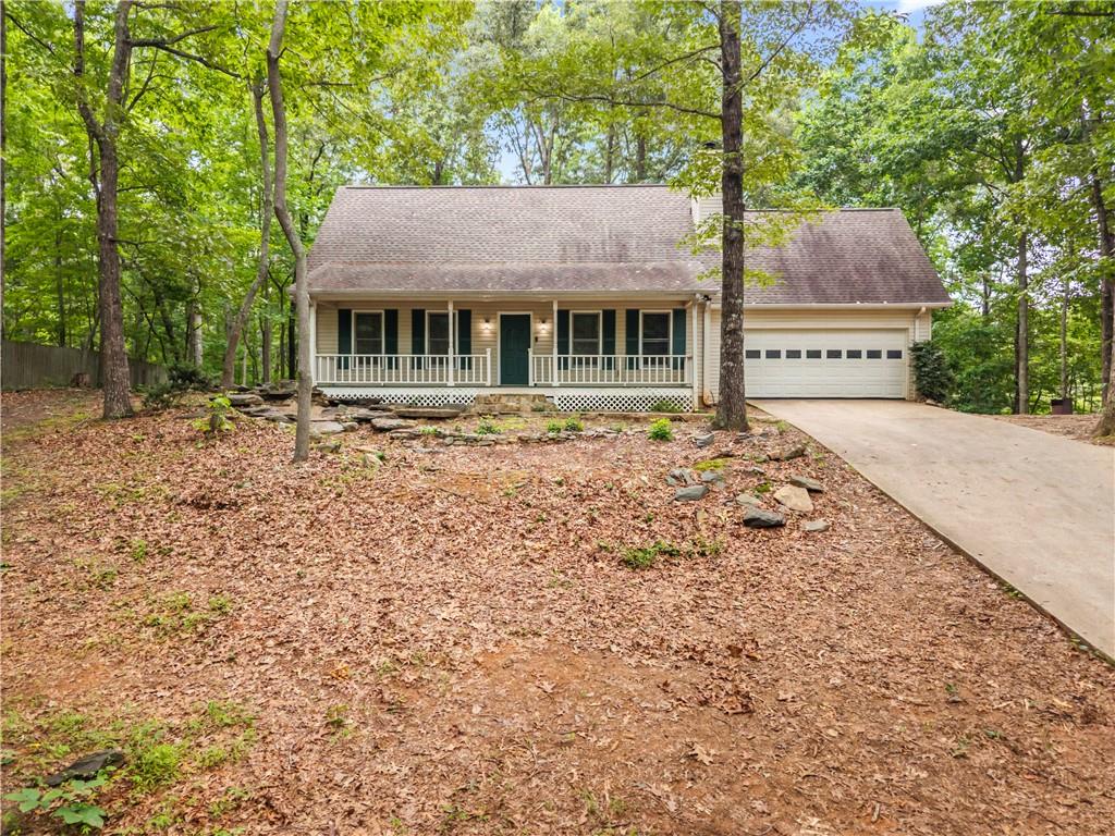 2009 Ben Higgins Road Dahlonega, GA 30533 - Photo 2 of 25 front view of house with a garden