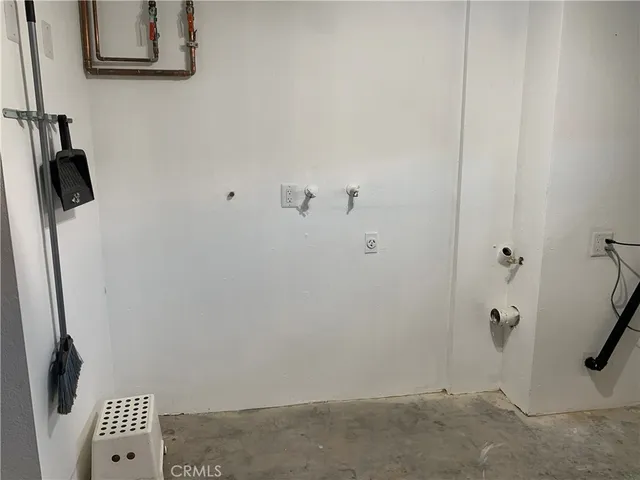 a view of front door with wooden floor