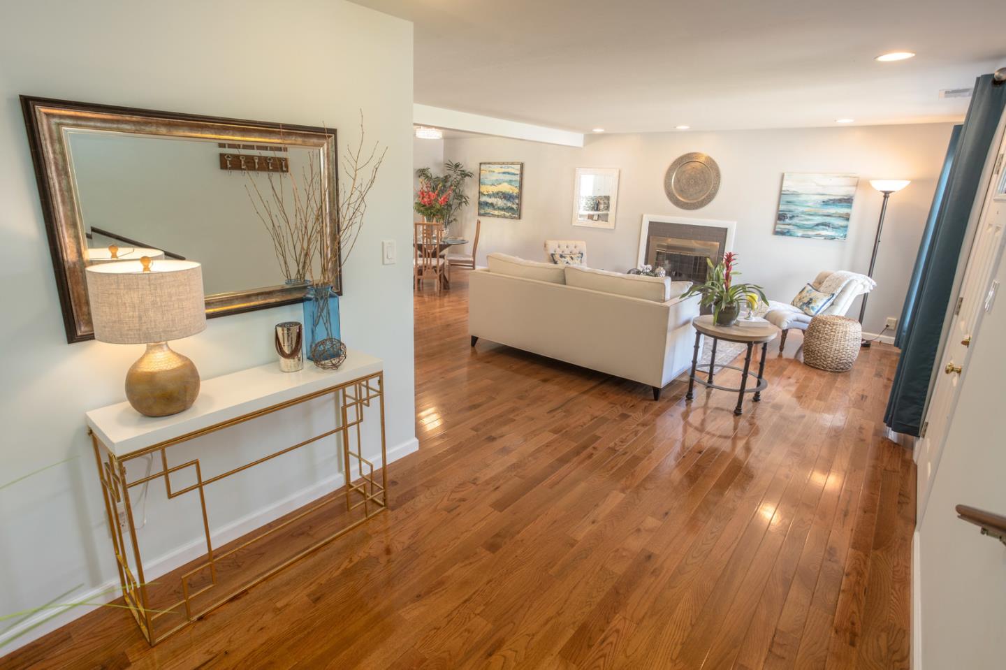 932 Crespi Drive Pacifica, CA 94044 - Photo 17 of 26 a living room with furniture and a wooden floor