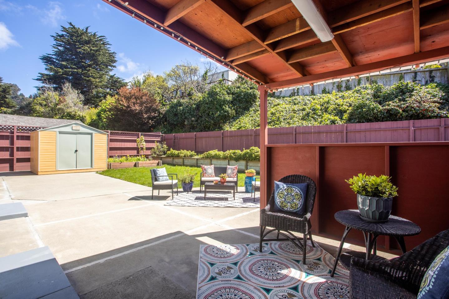 932 Crespi Drive Pacifica, CA 94044 - Photo 23 of 26 a building outdoor space with patio furniture and potted plants