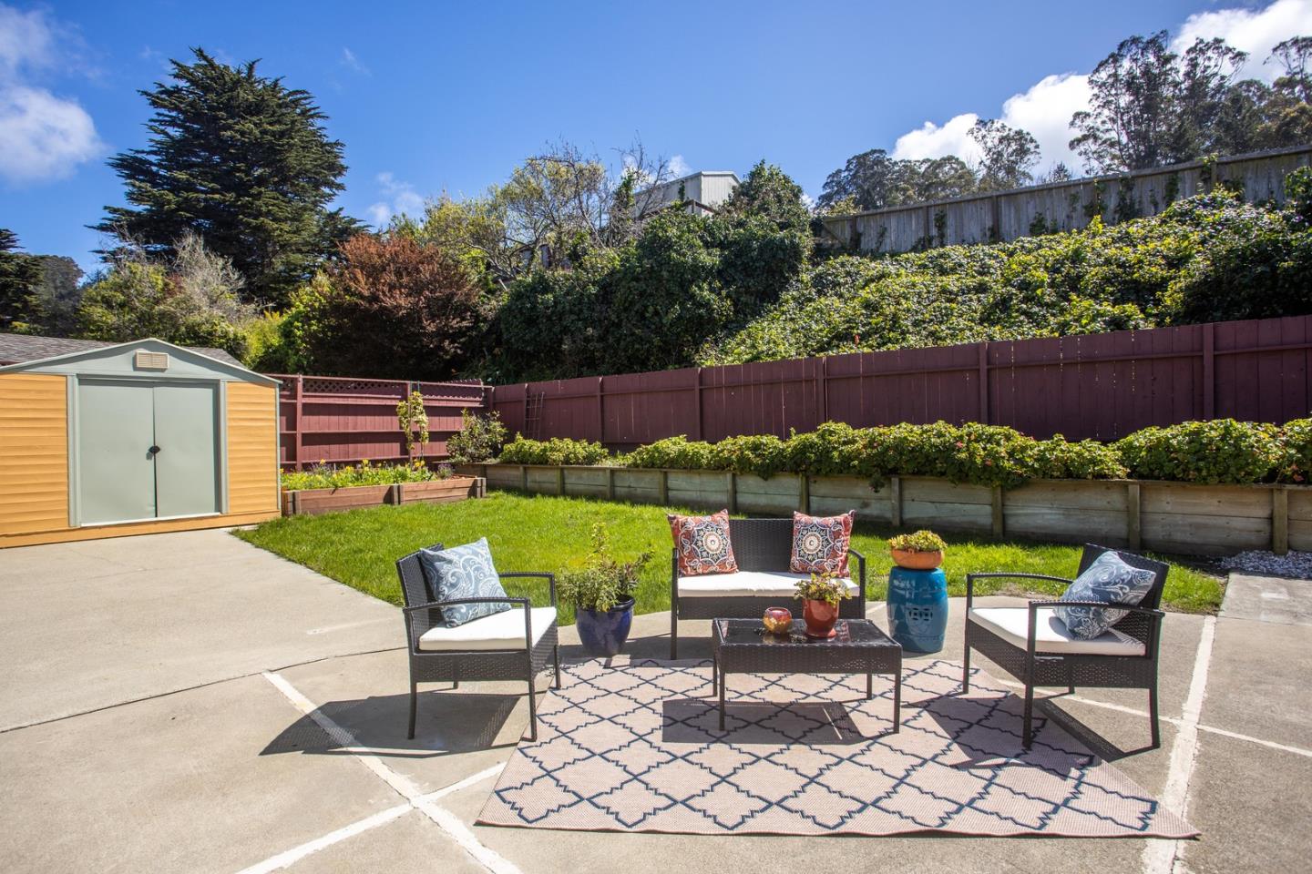 932 Crespi Drive Pacifica, CA 94044 - Photo 24 of 26 a view of a chairs and table in patio