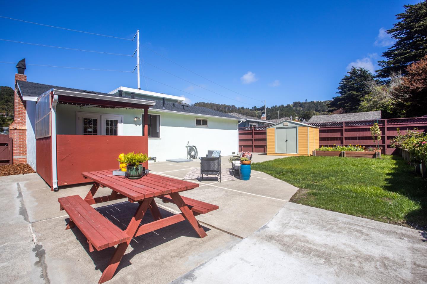 932 Crespi Drive Pacifica, CA 94044 - Photo 25 of 26 a front view of a house with garden
