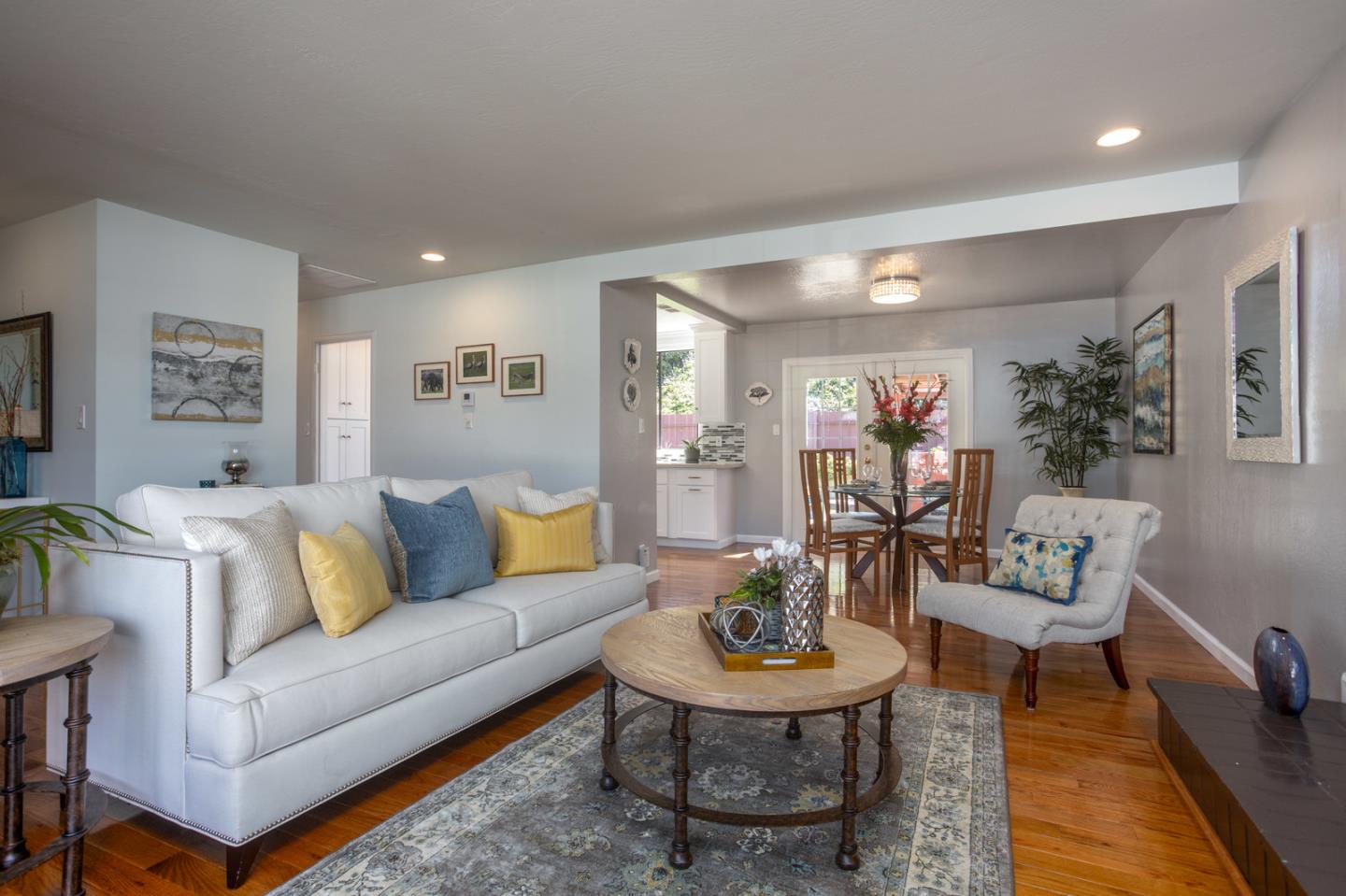 932 Crespi Drive Pacifica, CA 94044 - Photo 3 of 26 a living room with furniture and a wooden floor