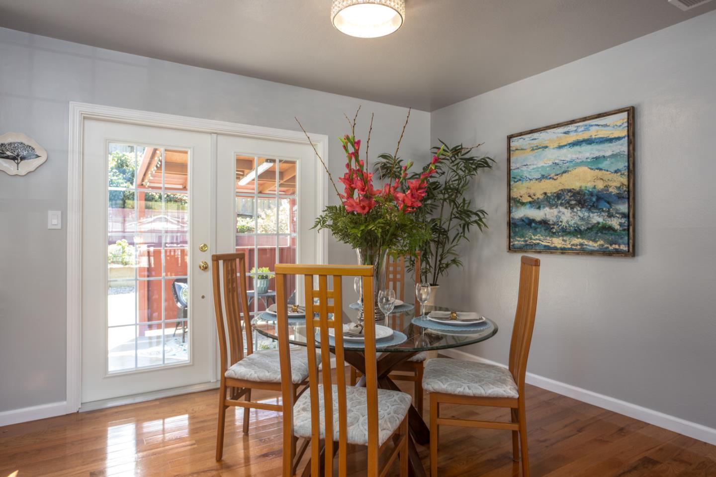 932 Crespi Drive Pacifica, CA 94044 - Photo 6 of 26 a view of a dining room with furniture window and wooden floor