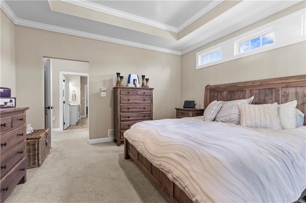 225 Brookside Drive Cranberry Township, PA 16066 - Photo 16 of 34 a bedroom with a bed and a dresser