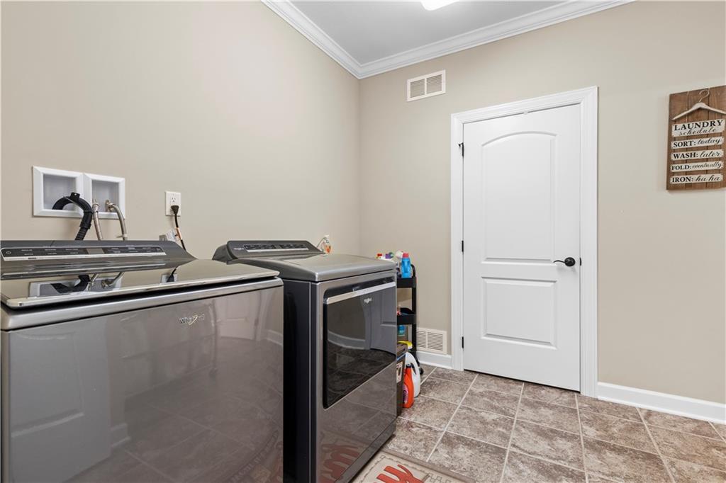 225 Brookside Drive Cranberry Township, PA 16066 - Photo 24 of 34 a utility room with dryer and washer