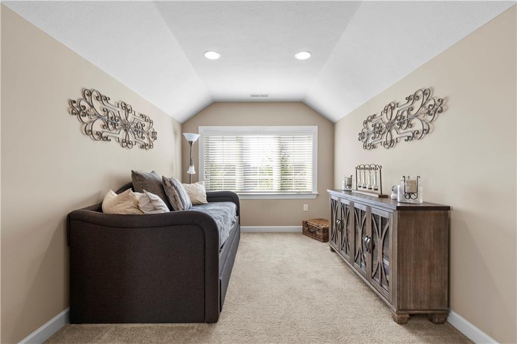 225 Brookside Drive Cranberry Township, PA 16066 - Photo 27 of 34 a room with a bed and windows