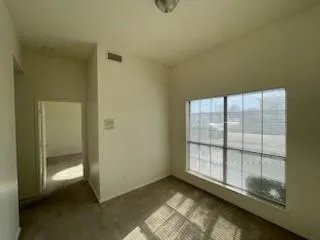 an empty room with windows