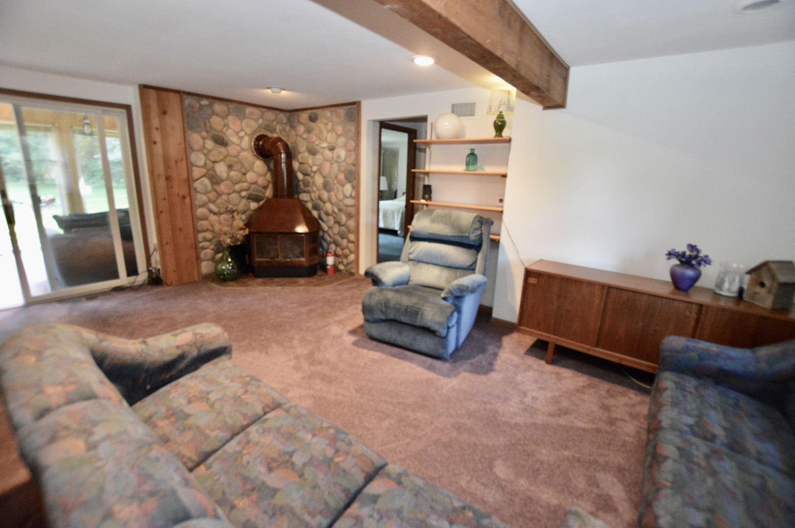 10905 Breezy Lawn Road Spring Grove, IL 60081 - Photo 8 of 20 a bedroom with furniture and a large window