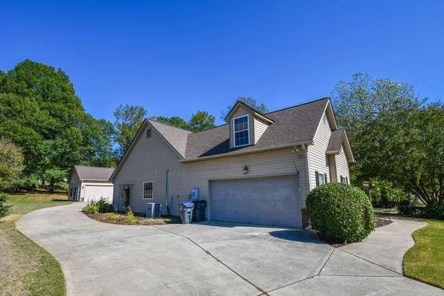 a living room with furniture flat screen tv and a fireplace