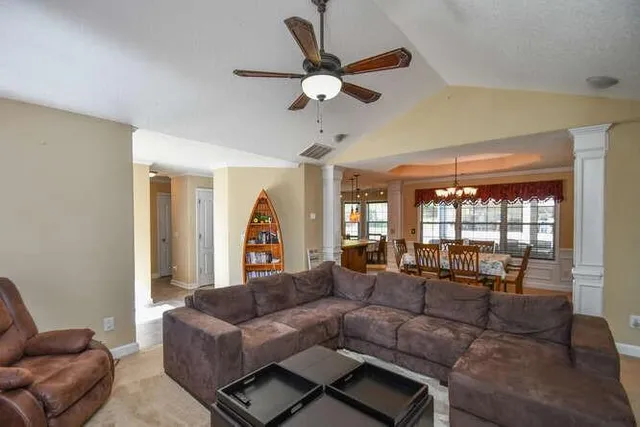 a view of a dining room and a window