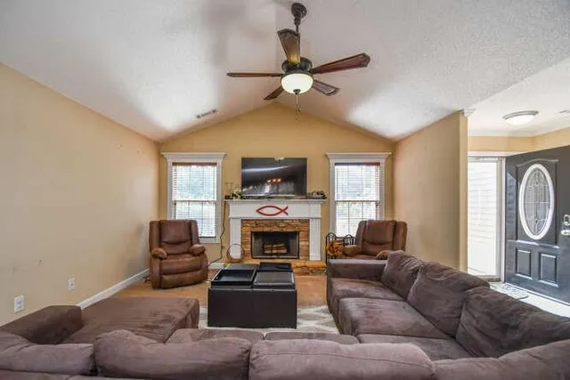 a kitchen that has a sink and a stove