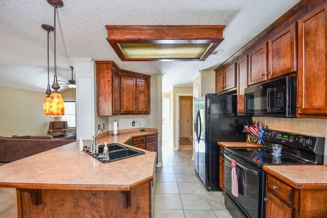 a en suite bathroom with a sink and a mirror