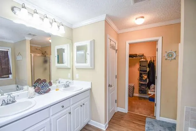 a view of an outdoor dining space with furniture and garden