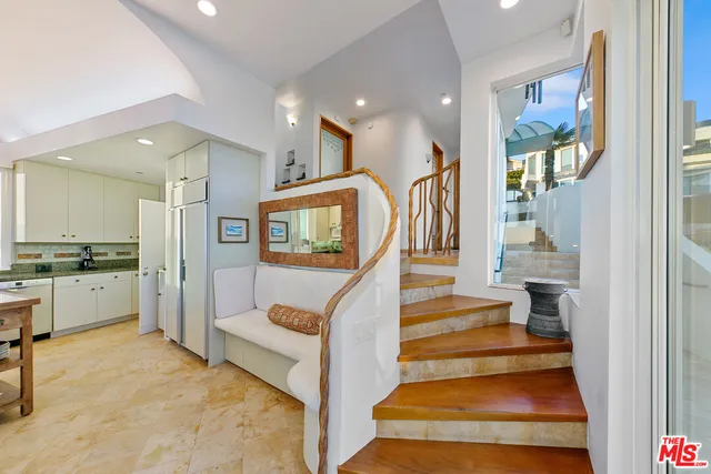 a large bathroom with a tub and shower