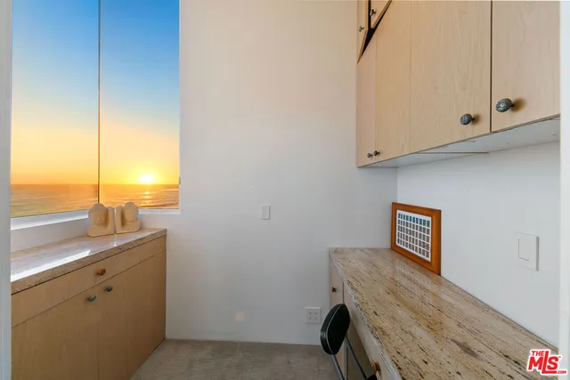 a bathroom with a shower and a mirror