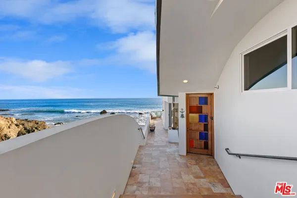 a view of water heater room with ocean view