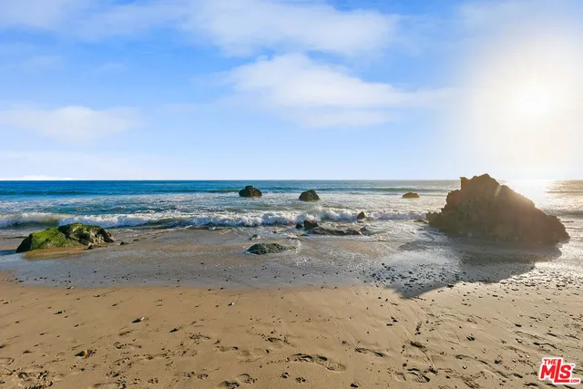 a view of a beach with a yard