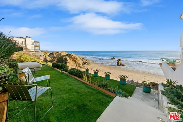 a view of a terrace with a garden