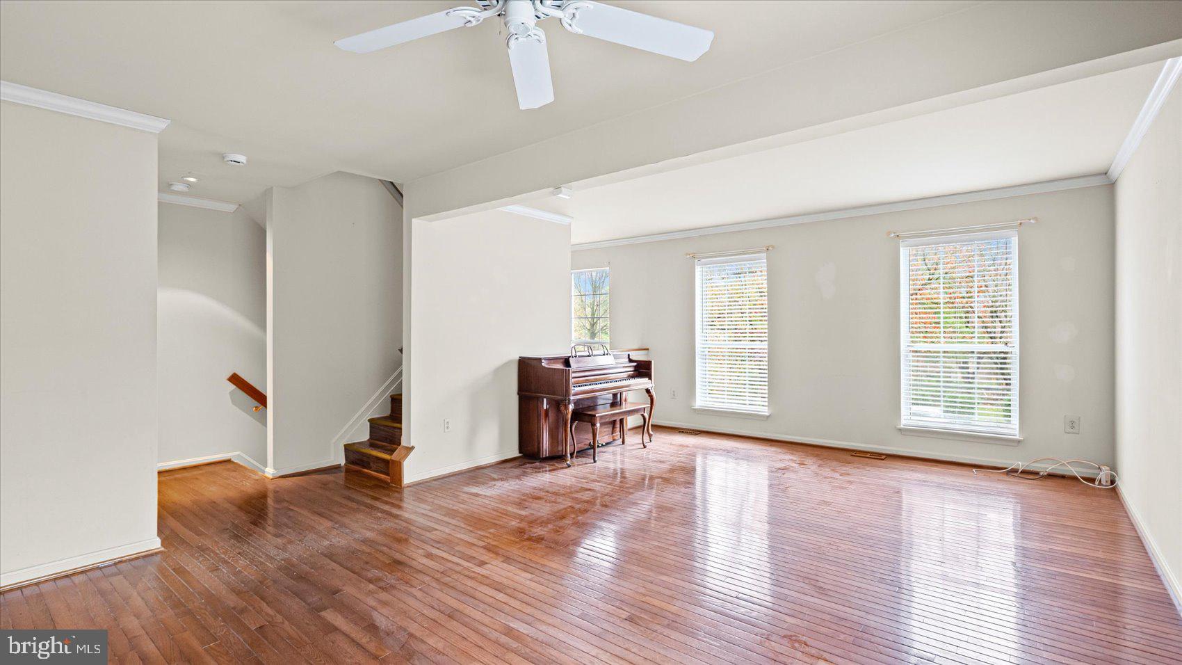 12 Mayapple Court Towson, MD 21286 - Photo 11 of 41 an empty room with wooden floor and windows