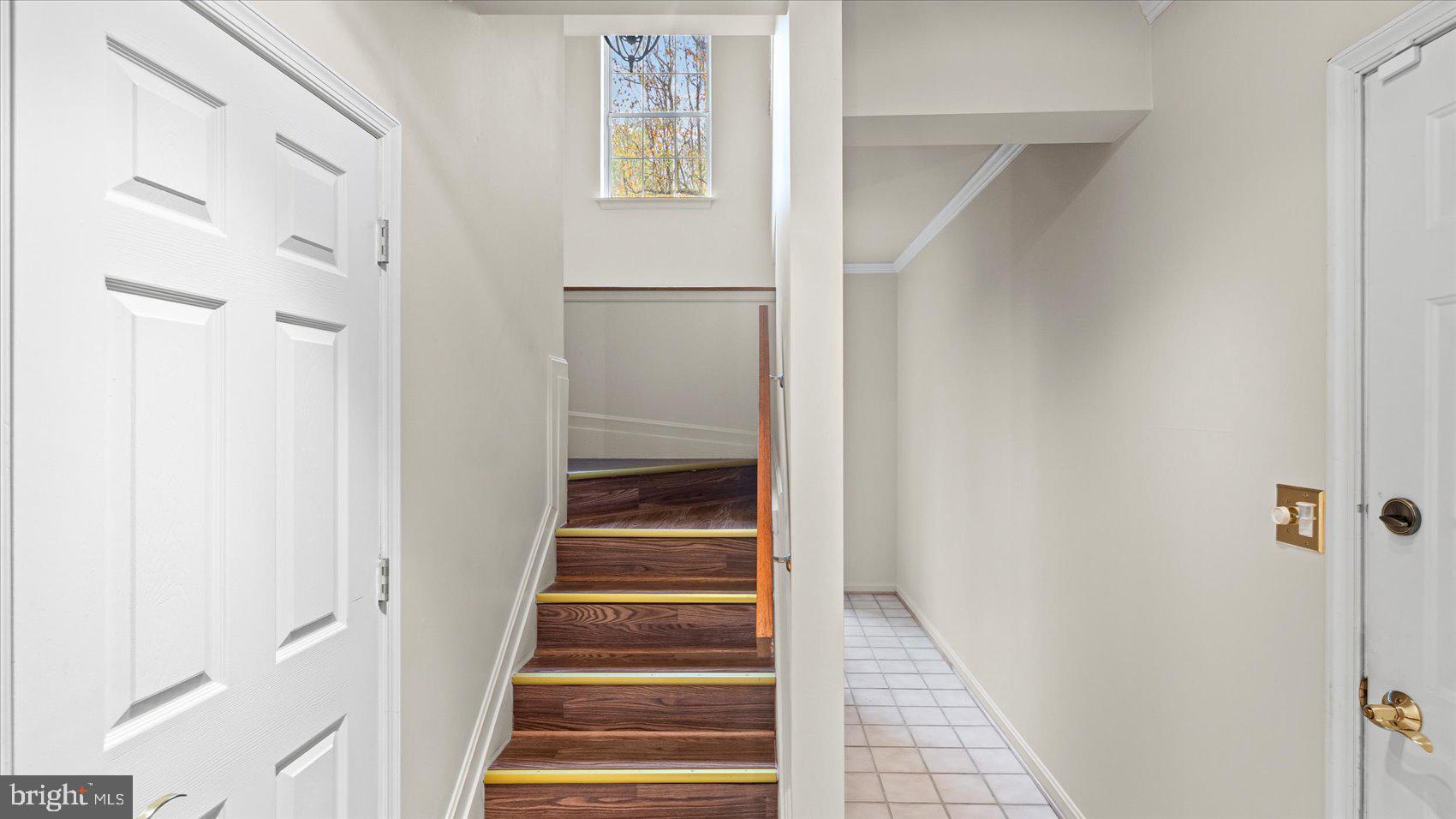 12 Mayapple Court Towson, MD 21286 - Photo 34 of 41 a view of a hallway with wooden floor and entryway