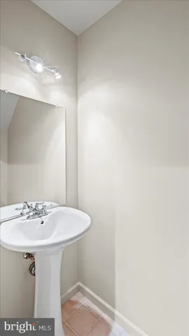 a view of backyard with a garden and deck