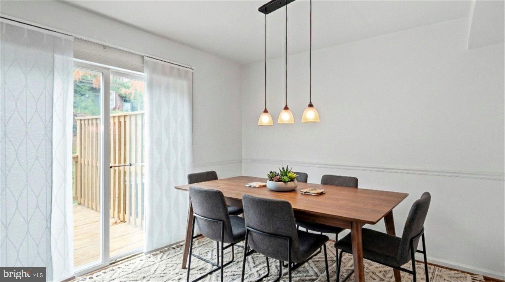 12 Mayapple Court Towson, MD 21286 - Photo 7 of 41 a view of a dining room with furniture window and wooden floor