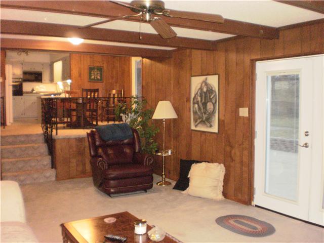 535 Rural Hill Road Nashville, TN 37217 - Photo 16 of 20 View from standing at the fireplace looking up to the kitchen/dining area. You can see the large room size. Also, these French doors were installed in '10 - they have the blinds built-in - they lead out to the back patio too. A real BONUS room.