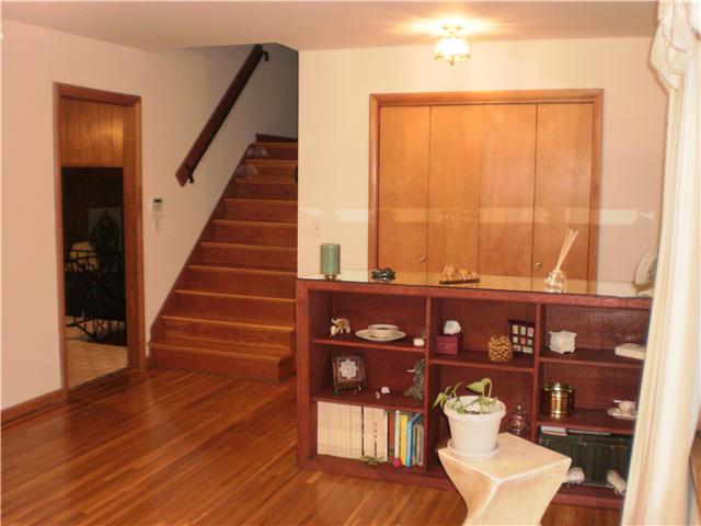 535 Rural Hill Road Nashville, TN 37217 - Photo 6 of 20 This one also shows the built-in. As you can see, there is a large coat closet. Displays the beautiful hardwood steps that go up to the 3 bedrooms and full bath. One bedroom is used as office now.